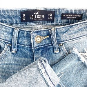 Hollister light wash distressed denim jeans.
